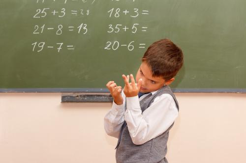 A boy counting