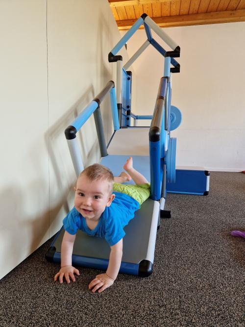 A boy slides down the QUADRO ramp