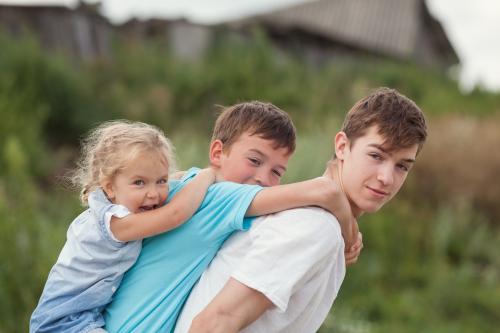 Children of different ages playing together