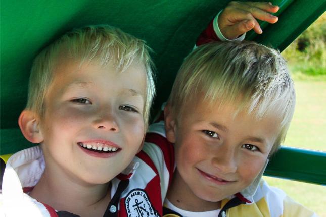 Two boys in QUADRO playhouse